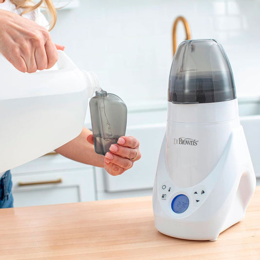 Calentador y esterilizador a vapor Deluxe de teteros, calentador rápido y uniforme de biberones, con panel LCD, fácil de usar, alertas de sonido cuando completa ciclo, funcionalidad 2en1 - Dr Brown's