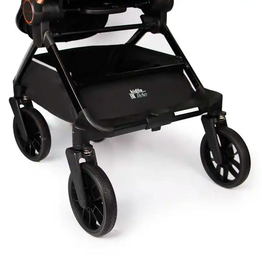 Coche paseador reversible para bebé, con respaldo ajustable, toldo en varias secciones adaptable, sistema de plegado compacto e incluye pañalera - Kidilo