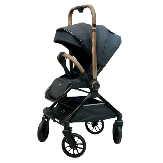 Coche paseador reversible para bebé, con respaldo ajustable, toldo en varias secciones adaptable, sistema de plegado compacto e incluye pañalera - Kidilo