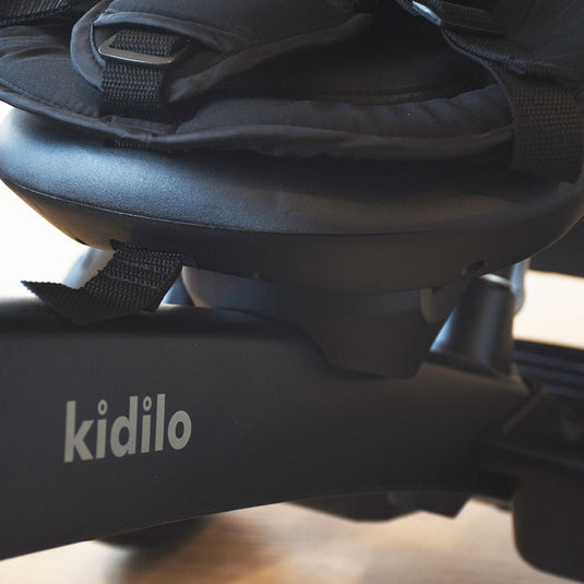 Coche paseador estilo Triciclo Deluxe, con sistema de plegado, asiento ajustable con rotación 360°, manillar de control parental, canasta de almacenamiento, campanilla, cinturón de seguridad de 5 puntos - Kidilo