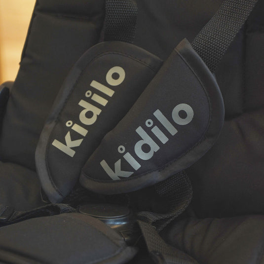 Coche paseador estilo Triciclo Deluxe, con sistema de plegado, asiento ajustable con rotación 360°, manillar de control parental, canasta de almacenamiento, campanilla, cinturón de seguridad de 5 puntos - Kidilo