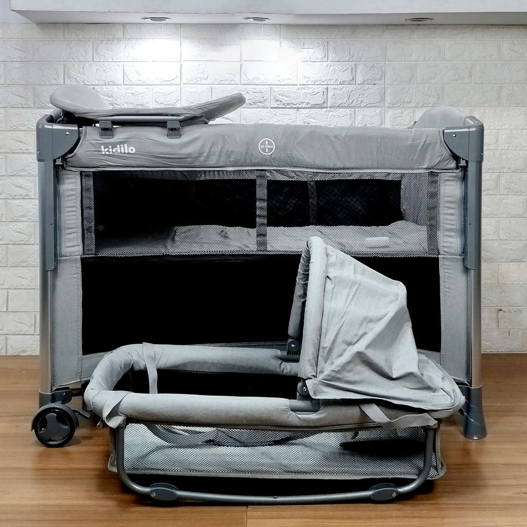 Corral colecho con cambiador y moisés, sistema plegable con bolsa viajera, con ruedas traseras para fácil movimiento, cambiador ajustable a la estructura, con mosquitero retirable - Kidilo