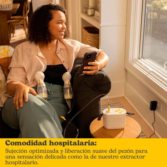 Extractor eléctrico de 2ª generación en Style Pro, ofrece eficiencia hospitalaria clínicamente probada, doble y portátil, de un tamaño compacto y peso ligero, con biberones, sistema de protección de pecho PersonalFit Plus - Medela