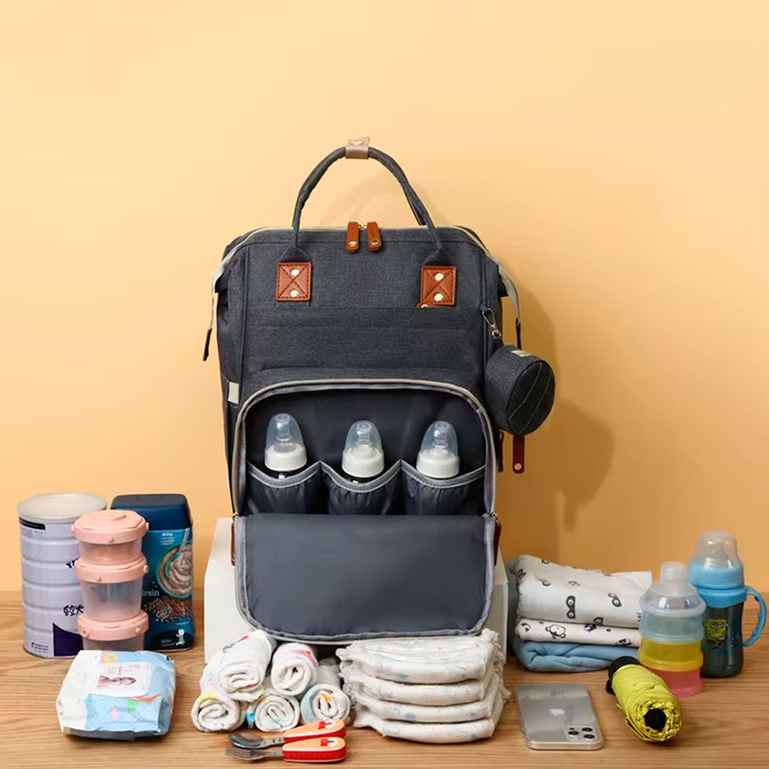Pañalera multifuncional con monedero, buena capacidad de almacenamiento, en materiales de alta calidad impermeable, con bolsillos térmicos, bolsillo de seguridad trasero para celular, laterales para botella y pañitos húmedos