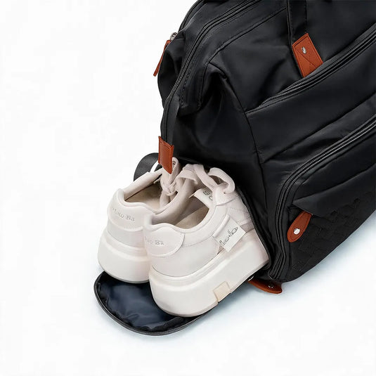 Pañalera bolso de mamá de gran capacidad, con panel tejido, cambiador, portachupos y correa de hombro.
