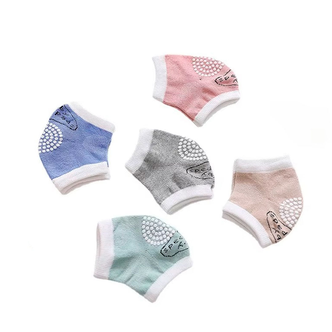 Rodilleras de algodón antideslizantes para el gateo del bebé, hechas en material hipoalergénico, ajustables, protegen contra el frio del suelo, en colores llamativos