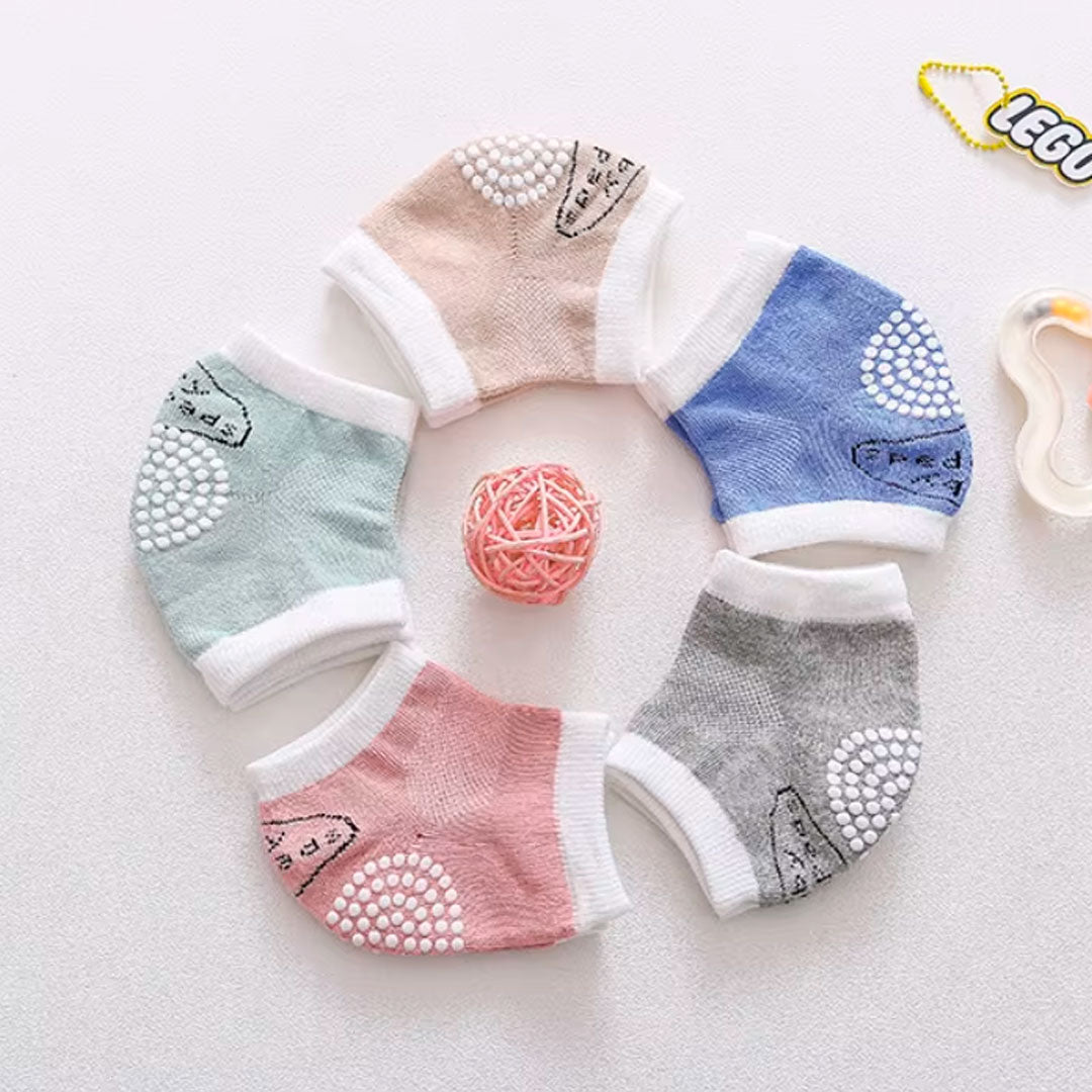 Rodilleras de algodón antideslizantes para el gateo del bebé, hechas en material hipoalergénico, ajustables, protegen contra el frio del suelo, en colores llamativos