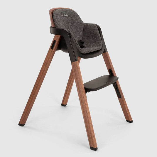 Silla comedor BRYN alta de lujo con diseño holandés, diseñada para usarse hasta aproximadamente los 6 años, con reposapiés ajustable y cinturón con tres puntos de ajustes, elaborada con madera de alta calidad - Nuna