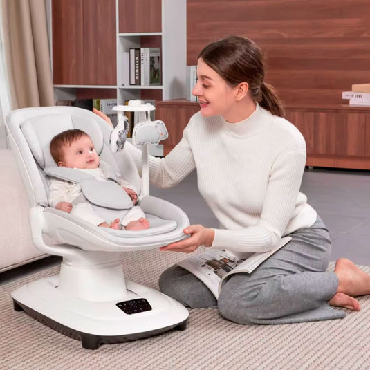 Silla mecedora 360° ajustable y control mediante APP, cuenta con pantalla táctil y control por medio de APP, 5 modos de balanceo, cuenta con 12 melodías grabadas, posiciones de reclinado - Mastela