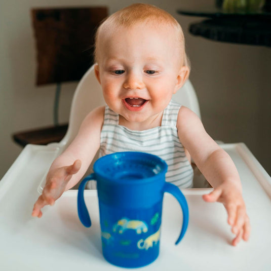 Vaso Cheers 360° antiderrames decorado con agarraderas, aprendizaje sin fugas, ideal para el acompañar el aprendizaje, fácil de limpiar y transportar, en material resistente 100% libre de BPA - Dr Brown's