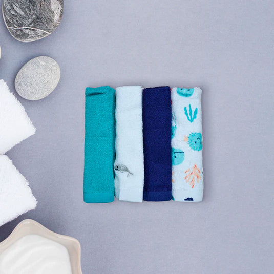Set en caja de babitas en algodón x4 unidades, paquete de toallitas de diferentes colores y diseños para bebés, hechas en material suave y absorbente, de tamaño ideal para llevar a todos lados - Hudson Baby