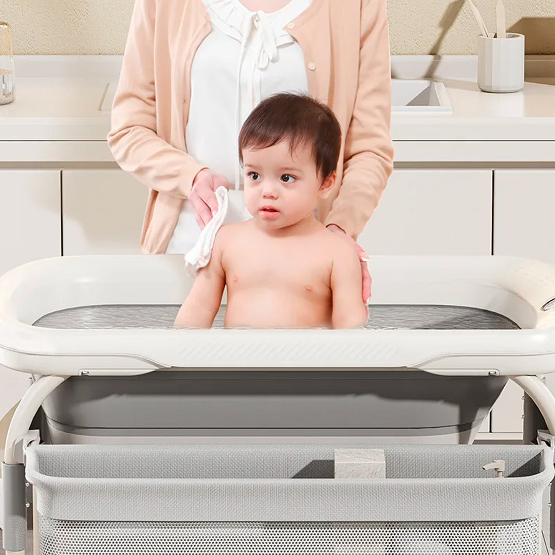 Bañera con soporte estable de cuatro puntos para recién nacido, con organizador, cambiador y base de almacenamiento