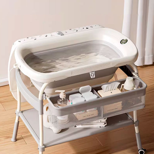Bañera con soporte y cambiador para bebé, con puntos de soporte estable, almacenamiento para tener lo necesario a la mano, ruedas con bloqueo para facilitar el traslado y asegurar su estabilidad - Toimoys