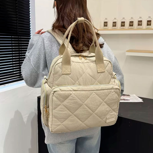 Bolso pañalera Duohui de múltiples compartimientos, con correa para uso lateral, de buena capacidad de almacenamiento, morral en tela resistente e impermeable para pañales