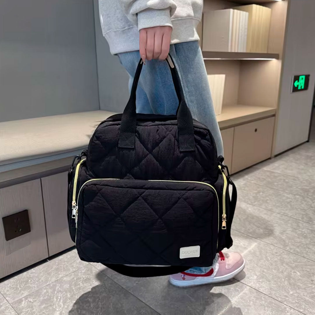 Bolso pañalera Duohui de múltiples compartimientos, con correa para uso lateral, de buena capacidad de almacenamiento, morral en tela resistente e impermeable para pañales