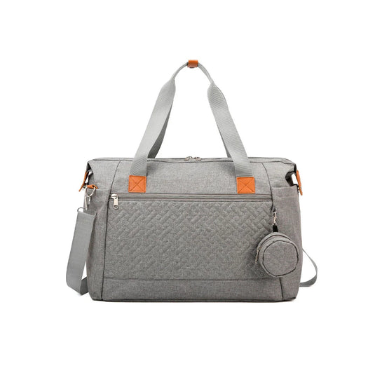 Bolso pañalera con diseño frontal tejido y monedero