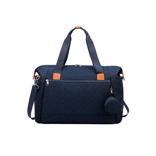 Bolso pañalera con diseño frontal tejido y monedero