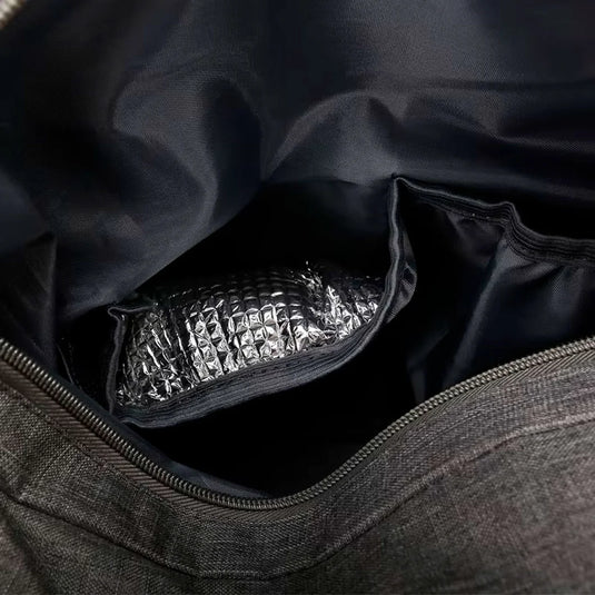 Bolso pañalera con diseño frontal tejido y monedero