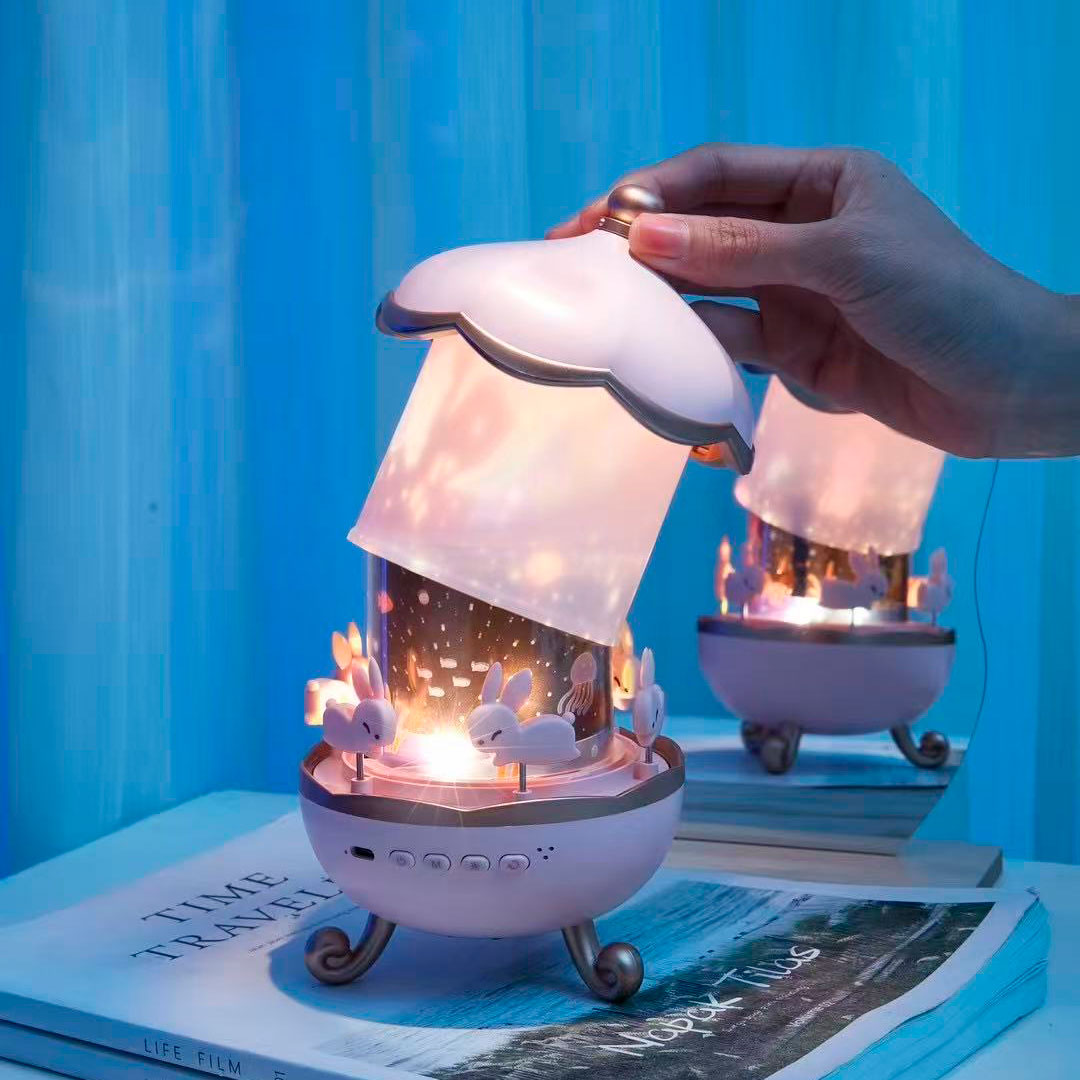 Caja de música Carrusel Didáctico con proyección, melodías suaves apara estimular el sueño, luces cambiantes, película de proyección de imágenes intercambiable, adorable diseño de carrusel de conejitos