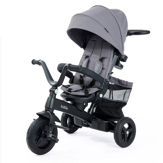 Coche paseador estilo Triciclo Deluxe, con sistema de plegado, asiento ajustable con rotación 360°, manillar de control parental, canasta de almacenamiento, campanilla, cinturón de seguridad de 5 puntos - Kidilo