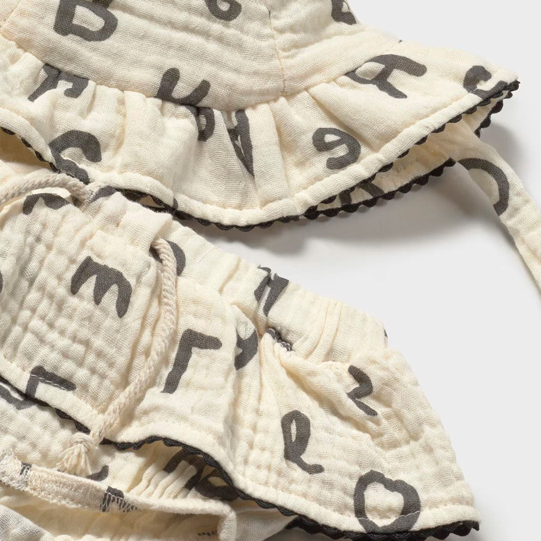 Conjunto 3pz con falda y gorro estampado letras, blusa manga corta con bolero, falta estampada con diseño letras, gorro ajustable a juego - Mayoral
