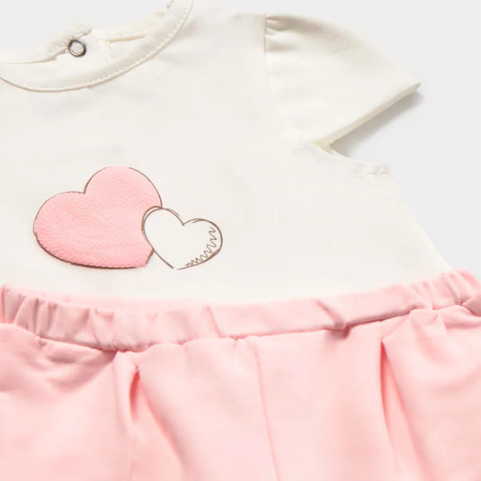 Conjunto con chaqueta rosa estampada corazoncitos - Mayoral