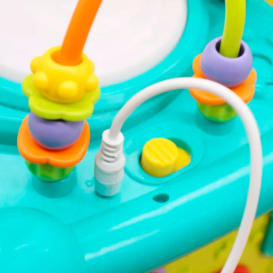Cubo didáctico multiactividades con conexión Bluetooth, diferentes caras con juegos, piezas de encaje, reconocimiento de diferentes colores, formas y números, funciones de luces y música