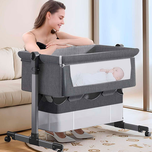 Cuna Colecho de altura ajustable con canasta y mosquitero, cuenta con ruedas con bloqueo de seguridad, material resistente y transpirable