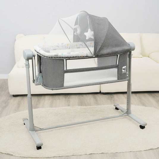 Cuna colecho eléctrica multifuncional con Bluetooth, con altura graduable, ajuste de balanceo por medio de control o panel digital, temporizador, modo corral - CoolBaby