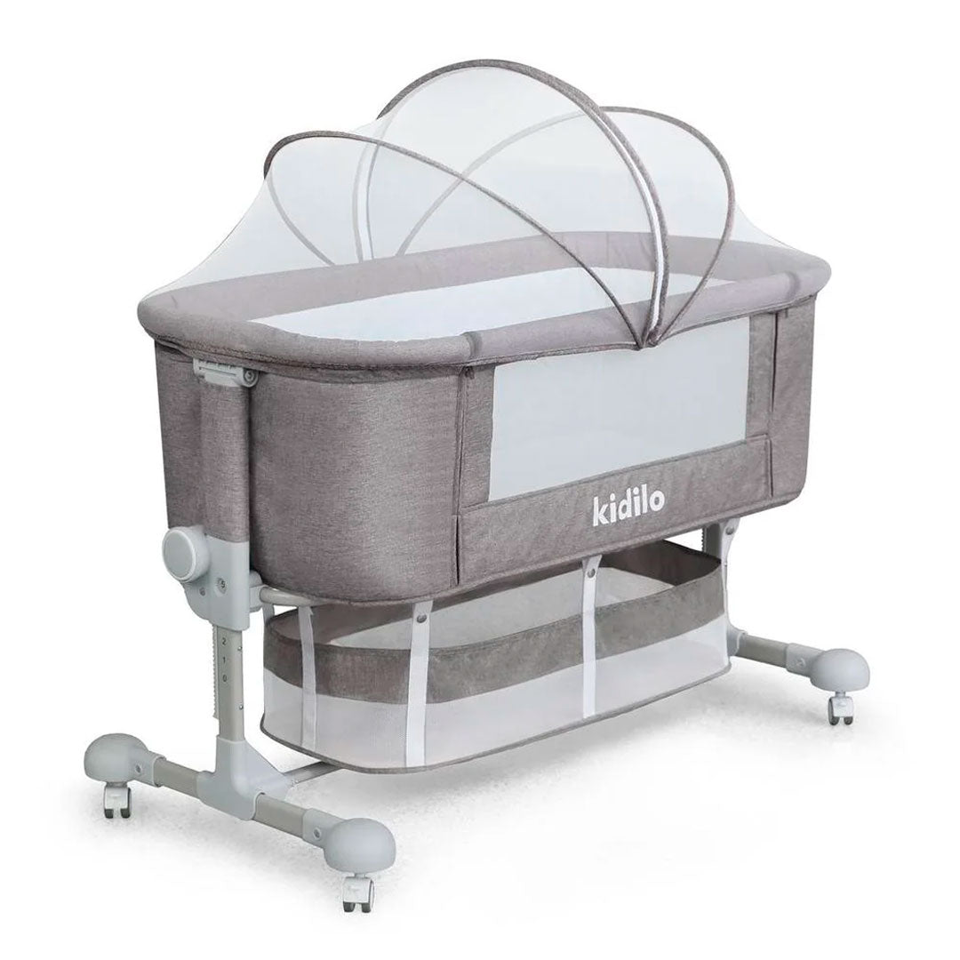 Cuna colecho con altura ajustable, canasta y mosquitero, sistema de plegado, amplio espacio de almacenamiento inferior, con ruedas para facilitar su movilidad, 6 niveles de altura ajustable - Kidilo