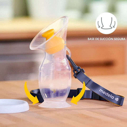 Hakka recolectora en silicona 100% BPA Free, de una capacidad de 100ml / 3.4 oz, con cordón para facilitar su uso, cuenta con tapa y base de sujeción segura - Medela - Cocco Semana 2026