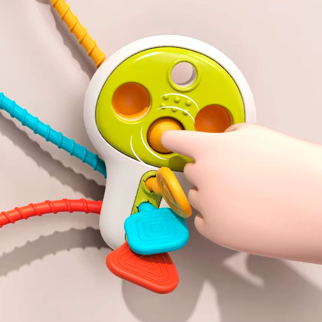 Llave educatica multifuncional para bebé, diseño y colores llamativos, juegos de cuerda, giros y sonidos que incentivan la exploración del juguete en tu bebé