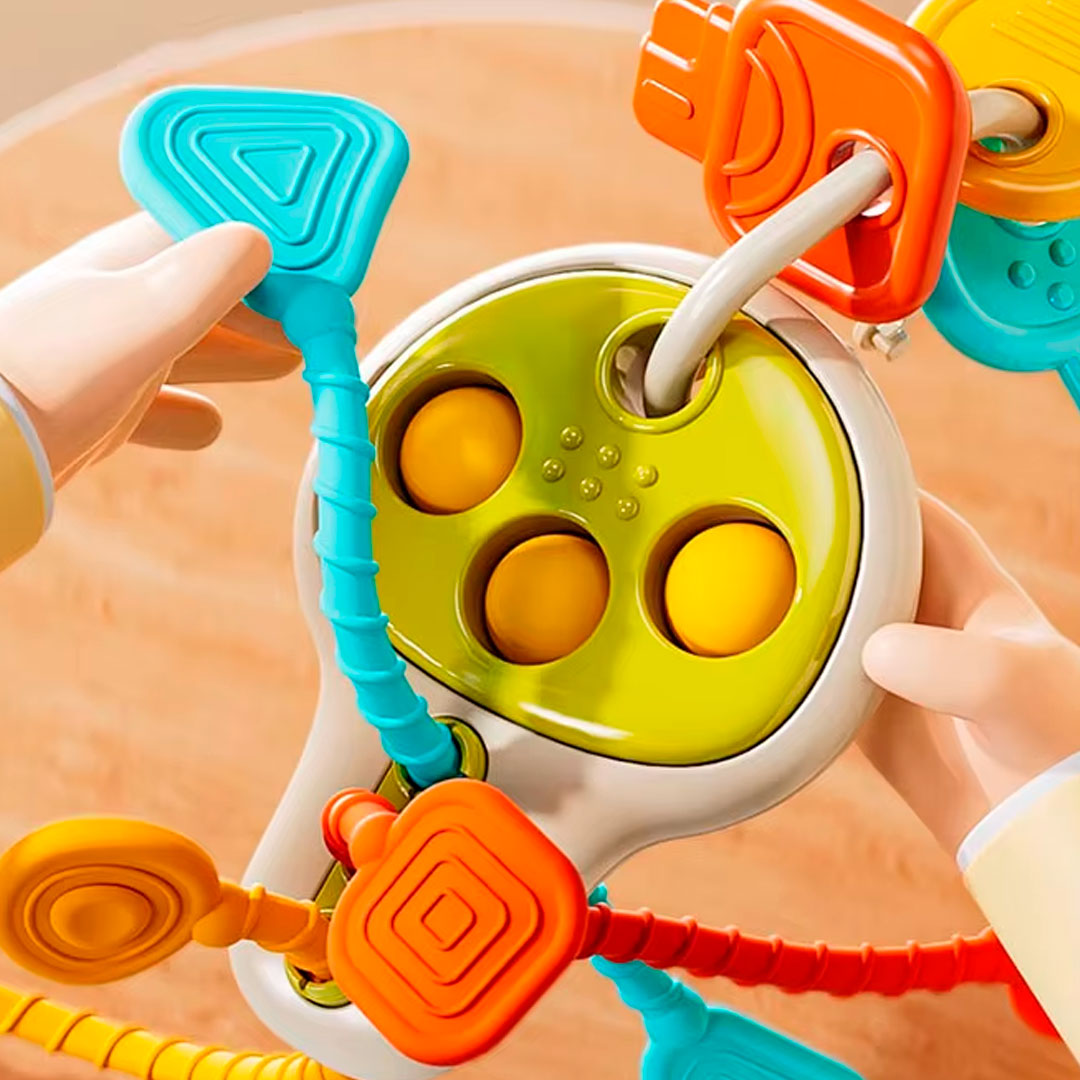 Llave educatica multifuncional para bebé, diseño y colores llamativos, juegos de cuerda, giros y sonidos que incentivan la exploración del juguete en tu bebé