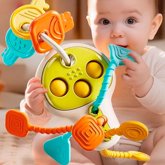 Llave educatica multifuncional para bebé, diseño y colores llamativos, juegos de cuerda, giros y sonidos que incentivan la exploración del juguete en tu bebé