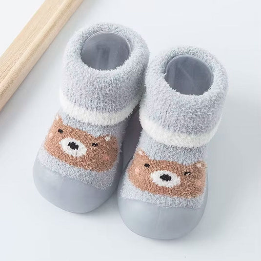 Medias tejidas de osito con suela antideslizante para bebé, zapatitos para primeros pasos, hechas en material cálido e hipoalergénico, con diseño elástico fácil de poner - Color & Life - Cocco Semana 2026