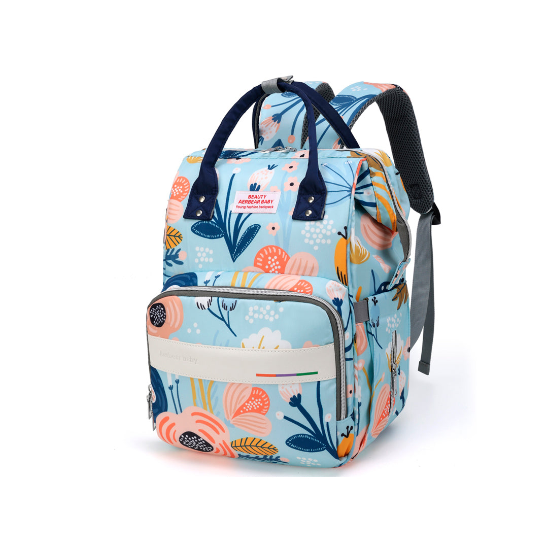 Pañalera Estampada tipo morral con bolsillos térmicos y bolsillo trasero Azul Cielo / Flores