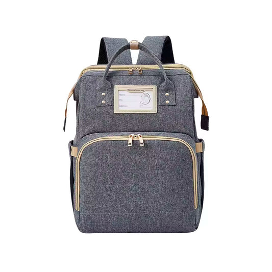Pañalera para bebé tipo morral con cambiador plegable y soporte para coche