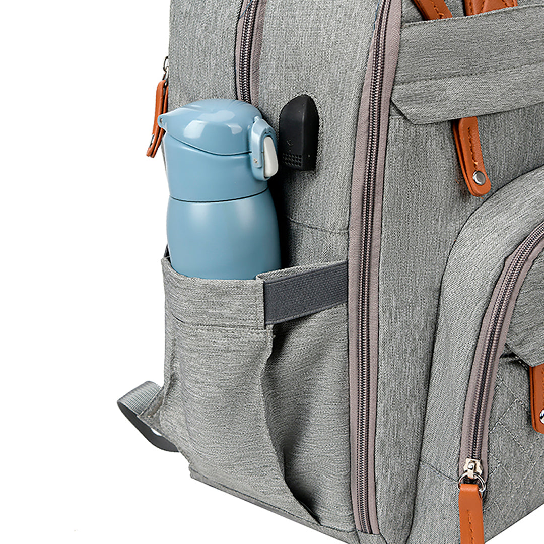 Pañalera tipo morral de gran capacidad, con bolsillos térmicos y cambiador portátil impermeable