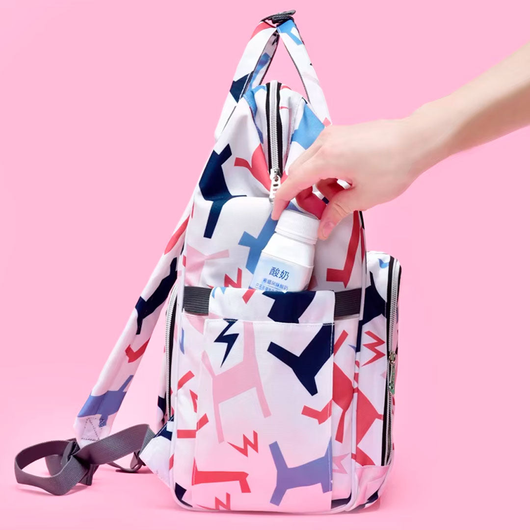 Pañalera multifuncional blanca con estampado, bolso tipo morral, cuenta con múltiples bolsillos indienprdientes, bolsillos térmicos, correas ajustables, amplio almacenamiento - Color & Life