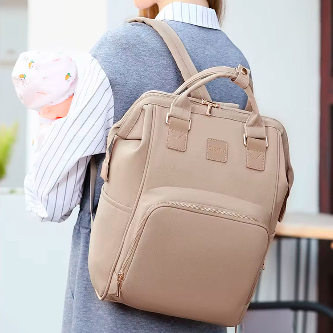 Pañalera morral Qixitu multifuncional de múltiples bolsillos, de buena capacidad de almacenamiento, varias divisiones de compartimientos para organizar, con bolsillos térmicos para teteros