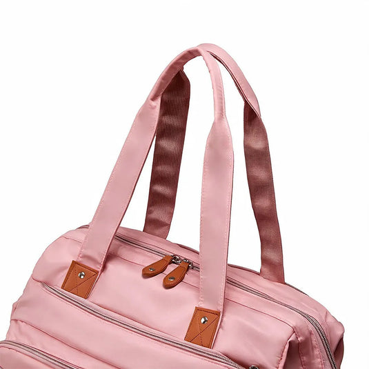 Pañalera bolso de mamá de gran capacidad, con panel tejido, cambiador, portachupos y correa de hombro.